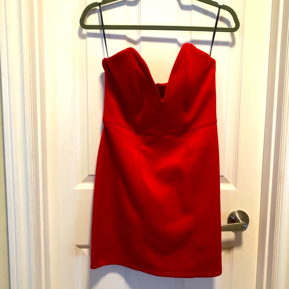 Strapless red dress.